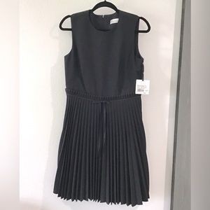Red Valentino. Never Worn. Black sleeveless pleated dress. Size EU 46, US 8.